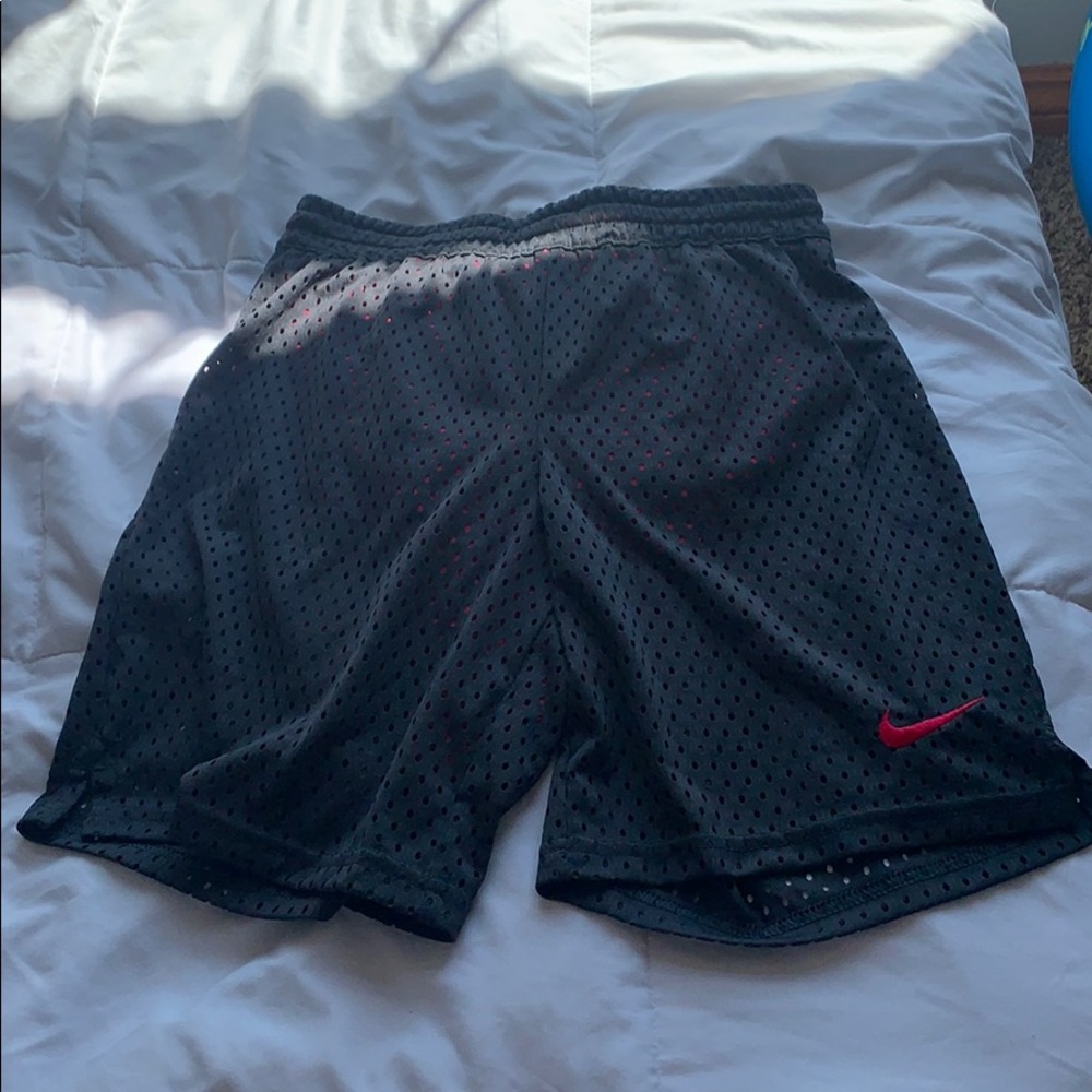 Girls size Large Grey/pink nike basketball shorts